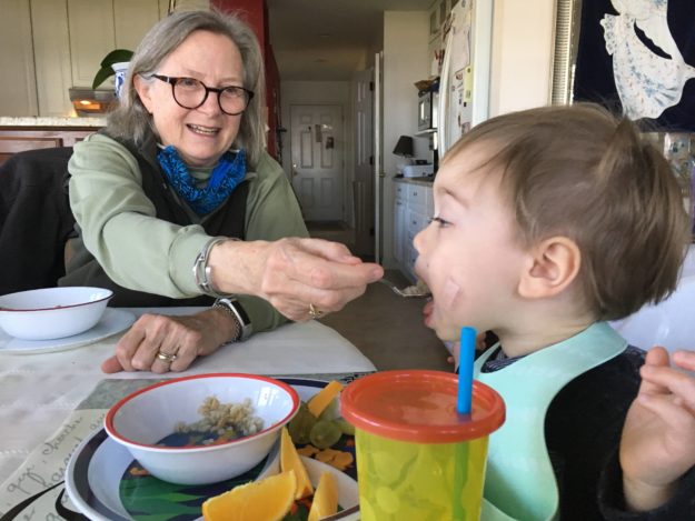 Grandma Nancy (Ne Ne) feeding Myron